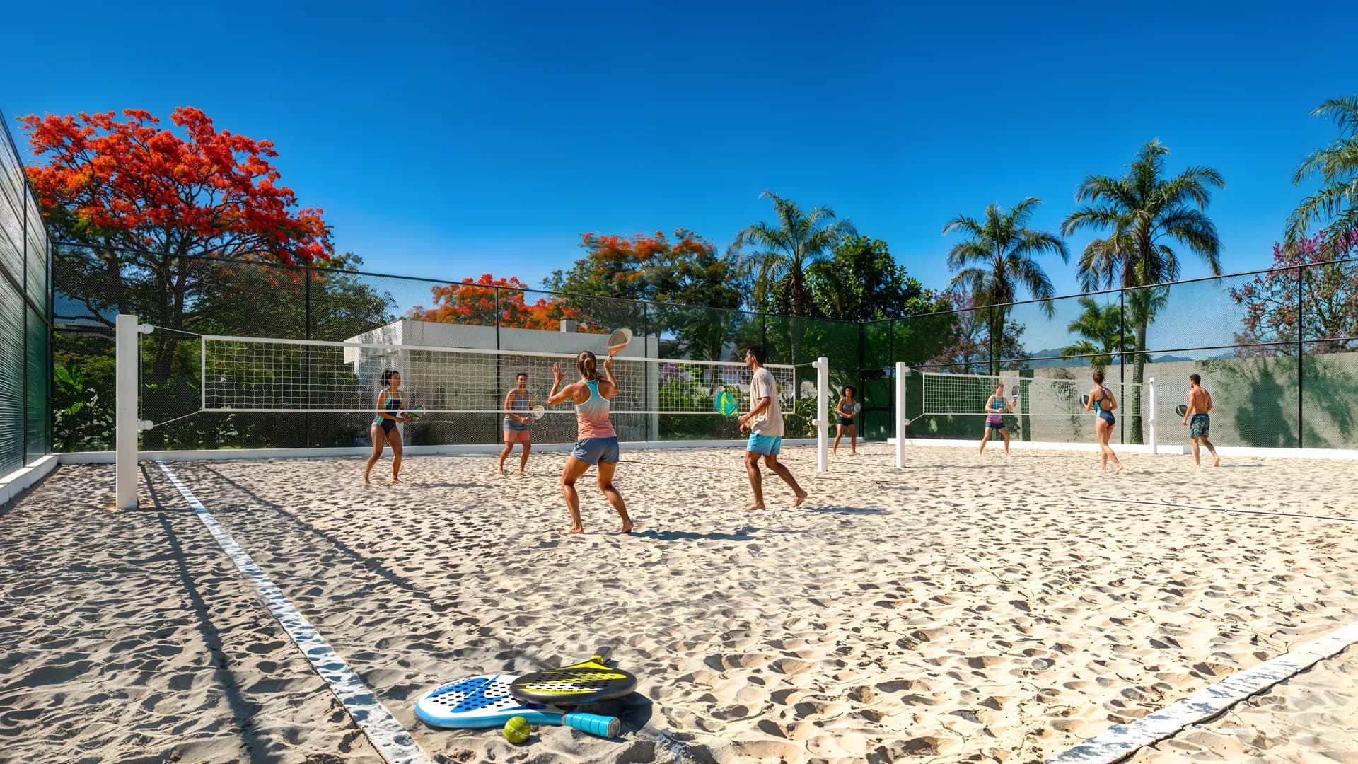 Beach Clube — Duas quadras de beach tennis com redes e marcações oficiais, iluminação para uso à noite e churrasqueira.